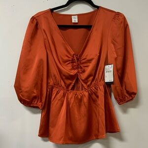 Melrose and market orange top